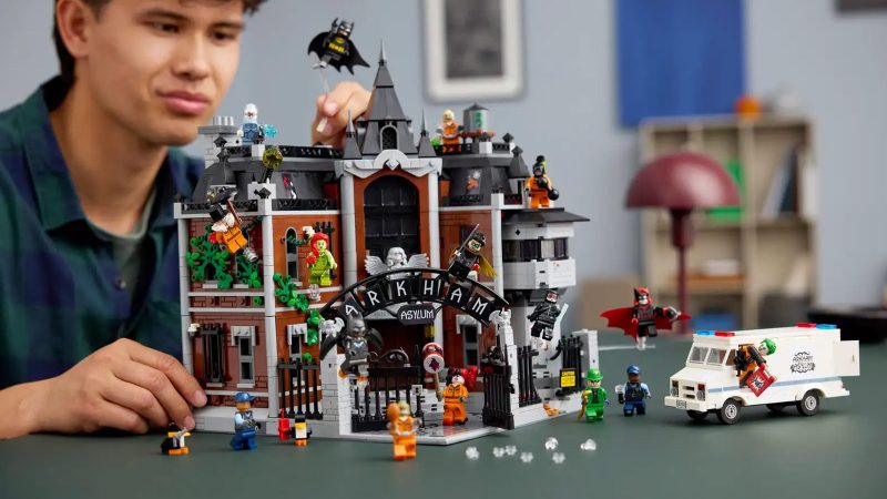 LEGO Arkham Asylum™ set displayed with gothic-inspired architecture, brick-built minifigure cells, iconic DC villains, and detailed interiors—ideal for Batman fans and LEGO collectors.