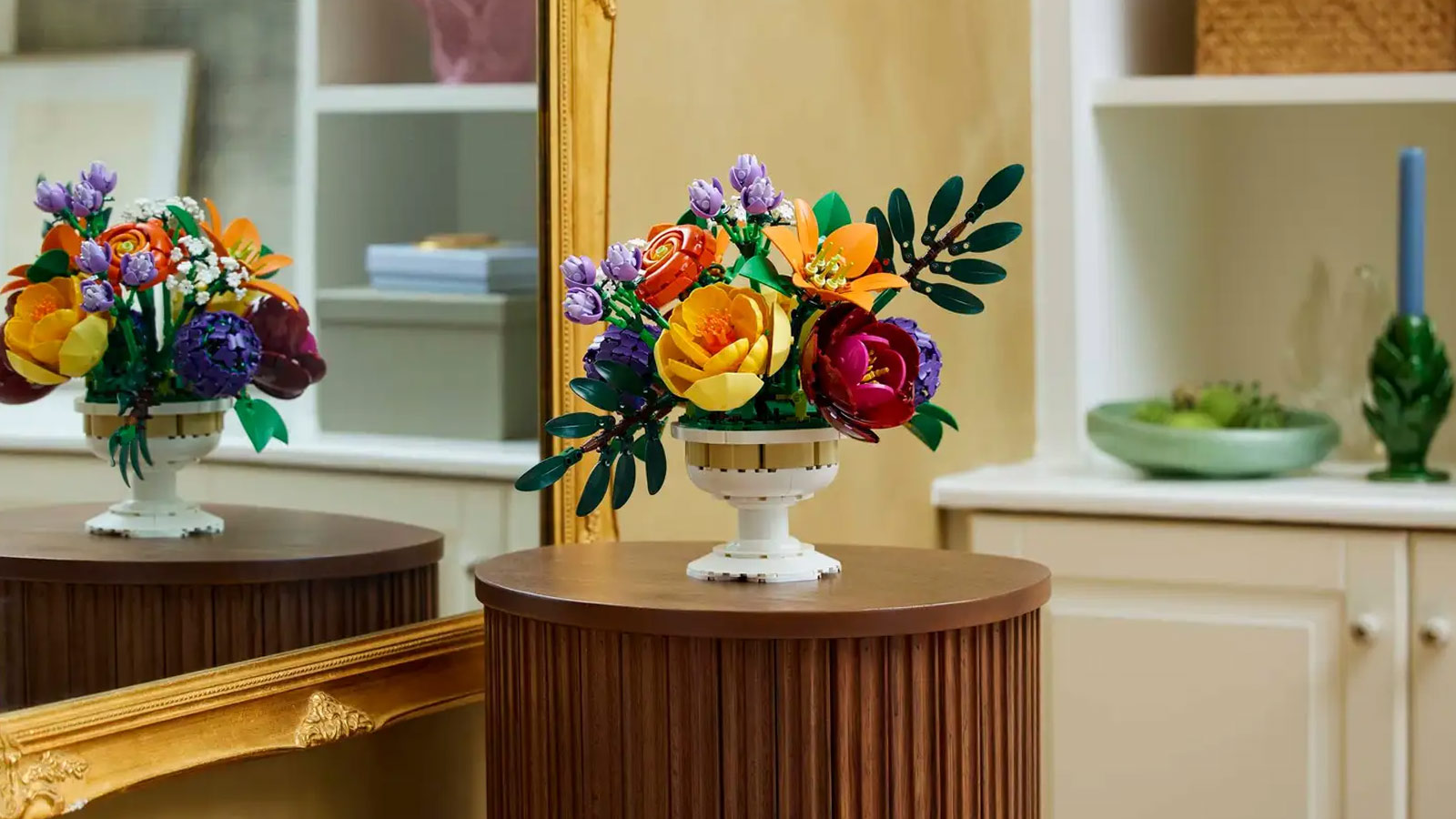 Colorful LEGO flower arrangement in a white pedestal vase—refined décor from the Best LEGO Sets for Adults 2025 collection.