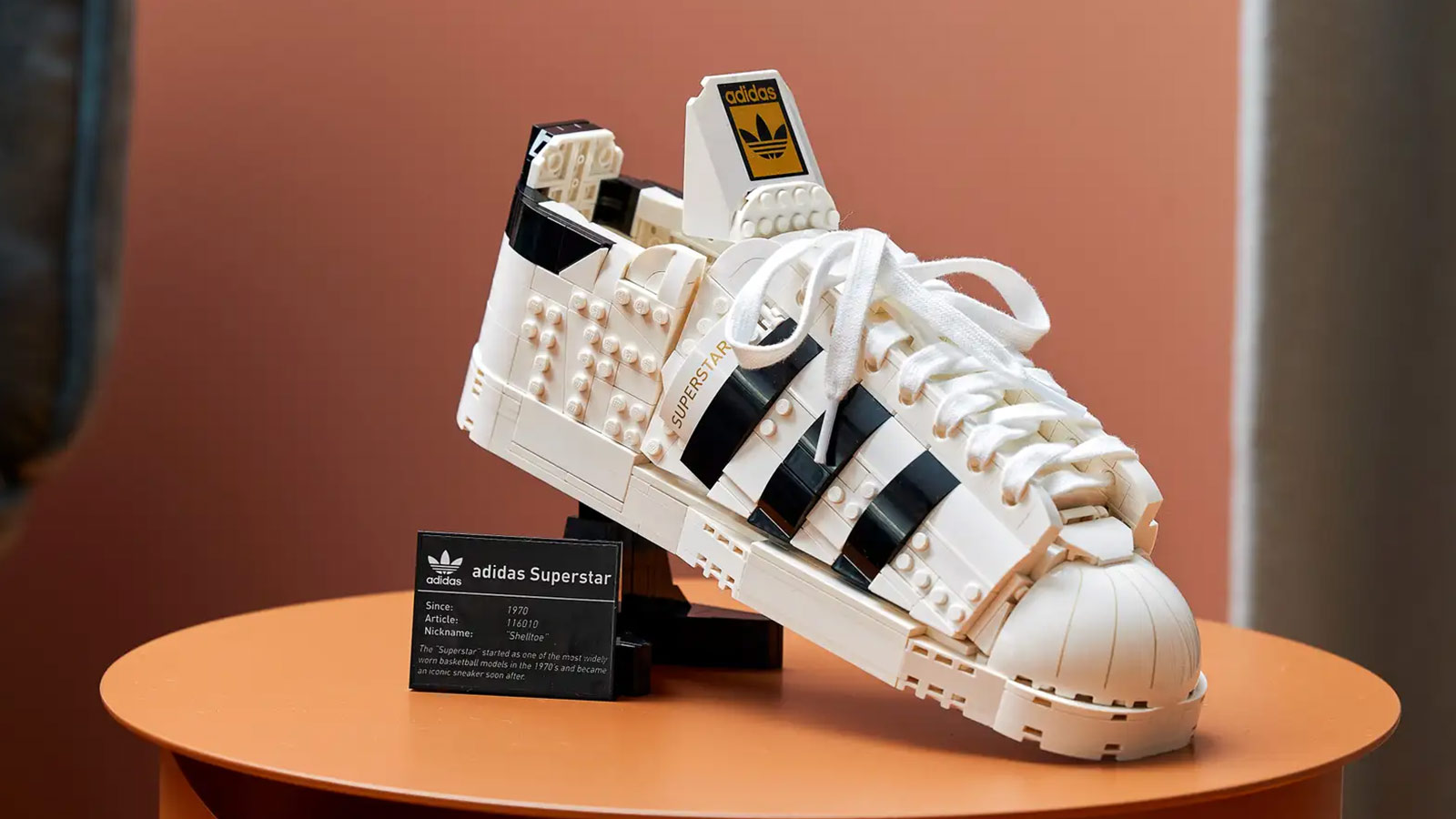 LEGO-built adidas Superstar sneaker with signature black stripes—one of the Best LEGO Sets for Adults 2025 for sneakerheads and collectors.