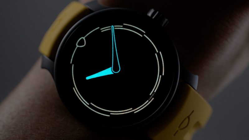 The MING 37.02 Monolith limited-edition DLC-coated minimalist watch with luminous sapphire dial, Sellita SW300.M1 movement, and mango FKM rubber strap.