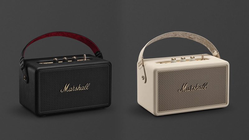 Marshall Kilburn III portable speaker with gold control panel, red velvet strap, and rugged speaker grille delivering 360° sound.