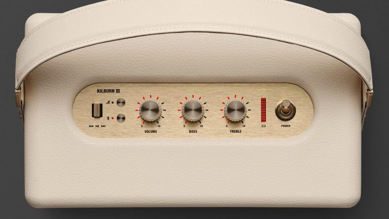 Marshall Kilburn III portable speaker with gold control panel, red velvet strap, and rugged speaker grille delivering 360° sound.