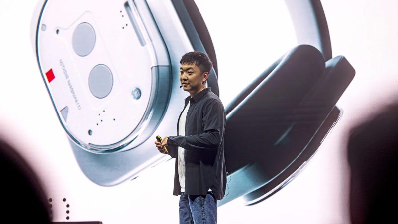 Nothing Phone (3) with Glyph Matrix display and red recording light, alongside KEF-tuned Headphone (1) with industrial design and tactile controls.