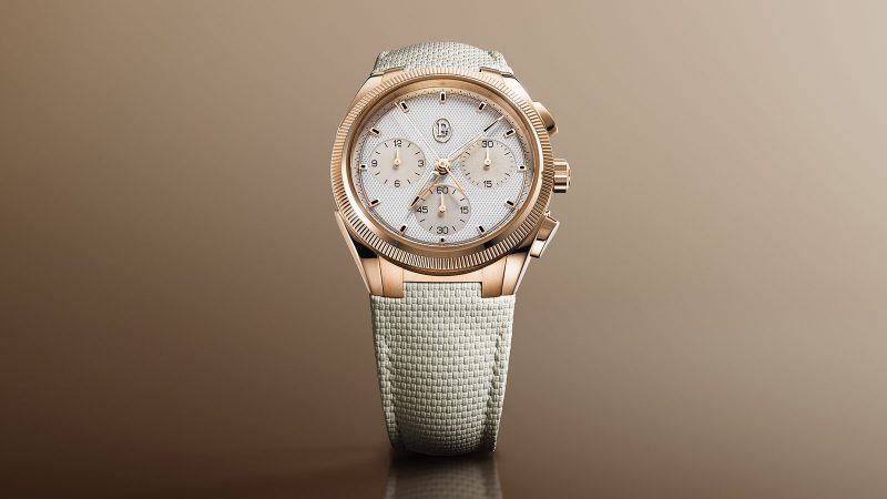 The Parmigiani Fleurier Tonda PF Sport Chronograph Rose Gold Sandstone features a guilloché dial, COSC-certified movement, and a Mediterranean-inspired rubber strap.