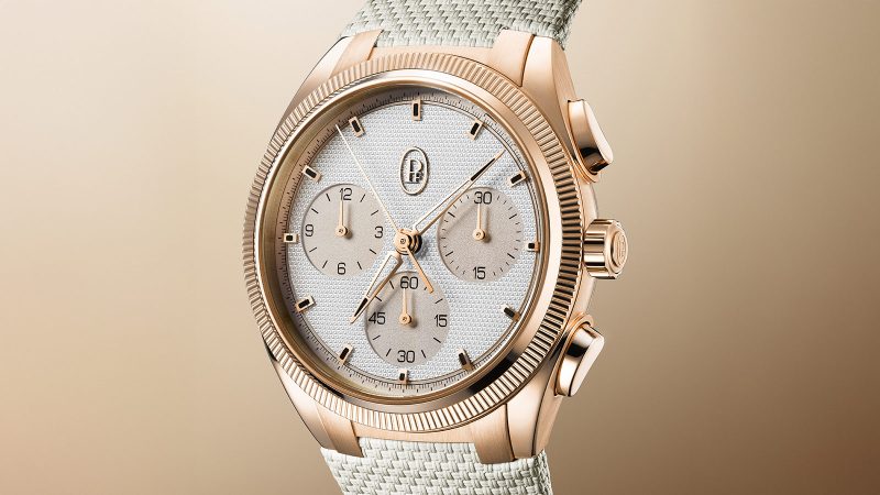The Parmigiani Fleurier Tonda PF Sport Chronograph Rose Gold Sandstone features a guilloché dial, COSC-certified movement, and a Mediterranean-inspired rubber strap.