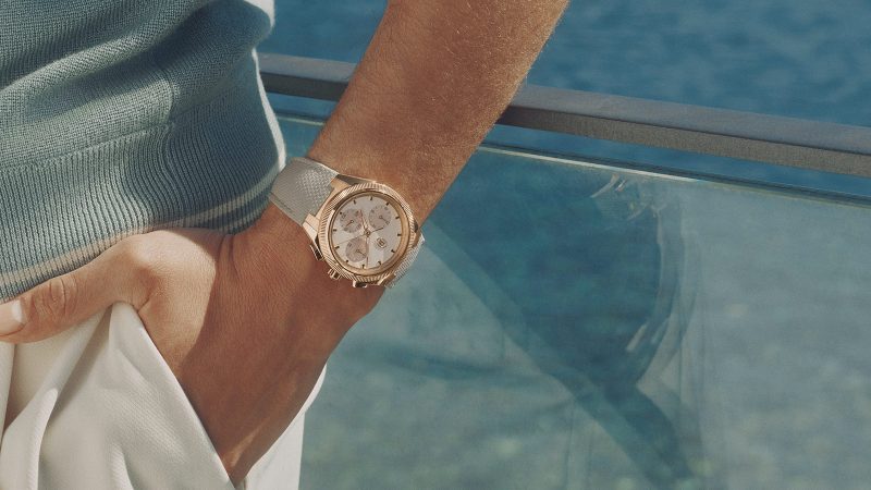 The Parmigiani Fleurier Tonda PF Sport Chronograph Rose Gold Sandstone features a guilloché dial, COSC-certified movement, and a Mediterranean-inspired rubber strap.
