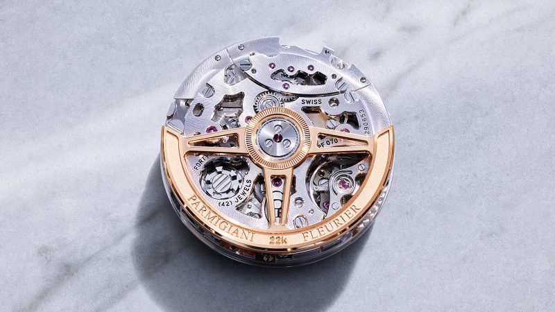 The Parmigiani Fleurier Tonda PF Sport Chronograph Rose Gold Sandstone features a guilloché dial, COSC-certified movement, and a Mediterranean-inspired rubber strap.