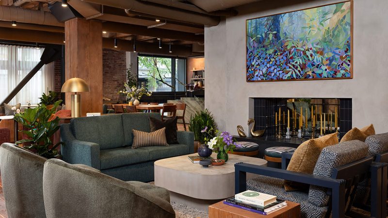 Populus Seattle Hotel showcases sleek minimalist architecture with floor-to-ceiling windows, natural materials, and panoramic views—perfect for modern travelers seeking smart luxury and design-forward accommodations.