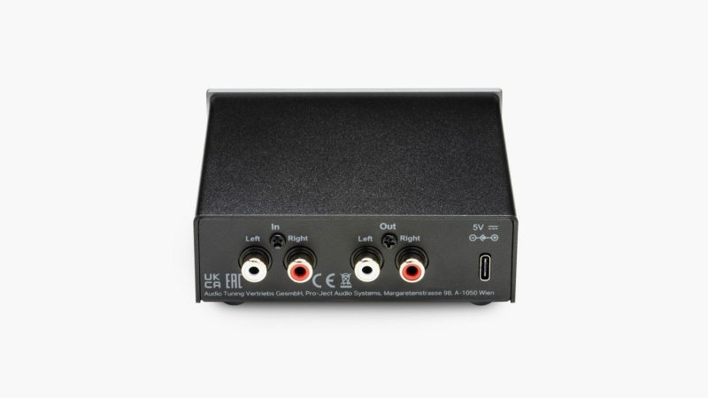 The Pro-Ject Head Box E headphone amplifier, available in black and silver, offers dual outputs, RCA inputs, and a full metal chassis for audiophile-grade headphone performance.