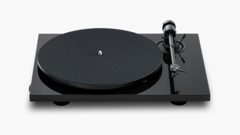 The Pro-Ject E1.2 turntable features an aluminum platter, a carbon tonearm, and a minimalist design, for high-fidelity vinyl playback.