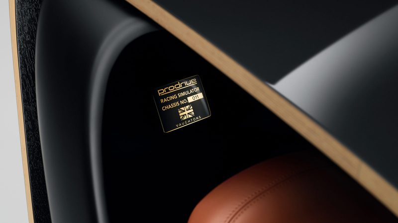 The Prodrive Racing Simulator features a carbon fiber monocoque frame, wraparound screen, racing seat, and professional steering hardware—combining high-performance engineering with luxury aesthetics.