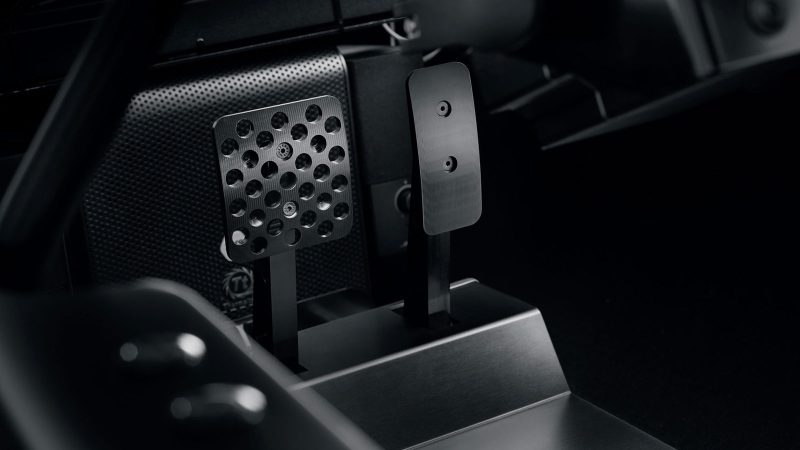 The Prodrive Racing Simulator features a carbon fiber monocoque frame, wraparound screen, racing seat, and professional steering hardware—combining high-performance engineering with luxury aesthetics.