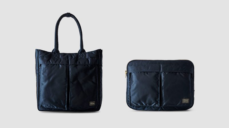 Reigning Champ Porter Bags in athletic-inspired, minimalist designs – rugged nylon exterior with sleek carrying straps and utility compartments, ideal for commuting.