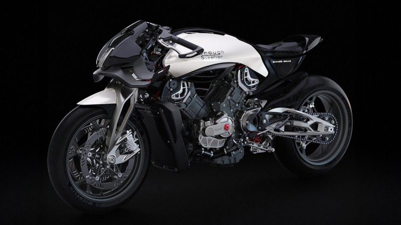RMB01 track motorcycle by Richard Mille and Brough Superior with exposed carbon frame, gear‑inspired rims, and watch‑style instrument cluster.