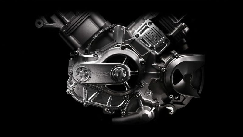 RMB01 track motorcycle by Richard Mille and Brough Superior with exposed carbon frame, gear‑inspired rims, and watch‑style instrument cluster.