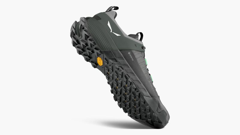 The Salewa Wildfire NXT GORE-TEX® shoe features aggressive tread, a waterproof GORE-TEX® upper, and a precise alpine fit.