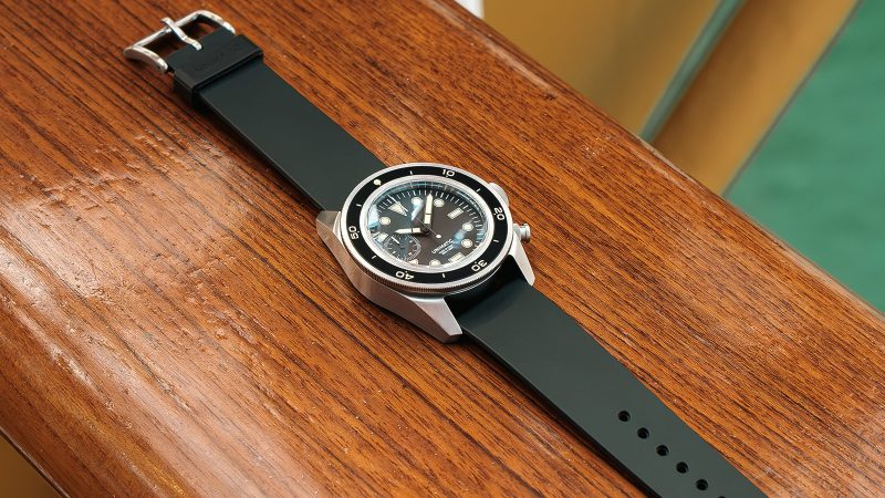 UNIMATIC Diving Heritage wristwatch collection featuring matte black, tropical brown, and vintage navy dials, creamy Super‑LumiNova markers, and brushed stainless steel cases.