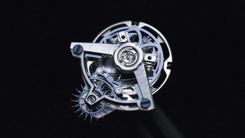 Ulysse Nardin Blast Free Wheel Maillechort transparent 45 mm white gold skeleton watch with tourbillon and blue rubber strap.