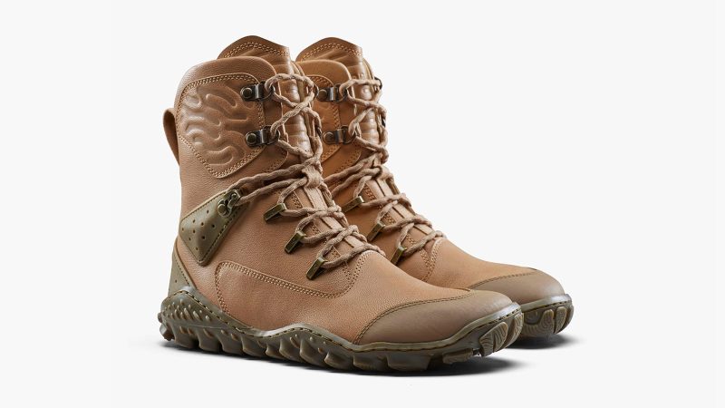 The VIVOBarefoot Desert ESC boot features a camel leather upper, a Michelin lugged outsole, and a high ankle collar designed for protection in desert and extreme terrain.