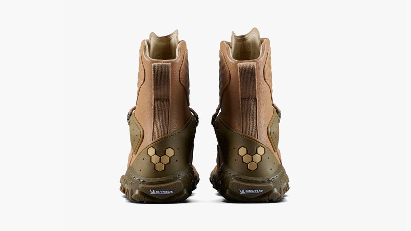 The VIVOBarefoot Desert ESC boot features a camel leather upper, a Michelin lugged outsole, and a high ankle collar designed for protection in desert and extreme terrain.