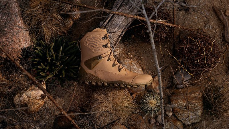 The VIVOBarefoot Desert ESC boot features a camel leather upper, a Michelin lugged outsole, and a high ankle collar designed for protection in desert and extreme terrain.