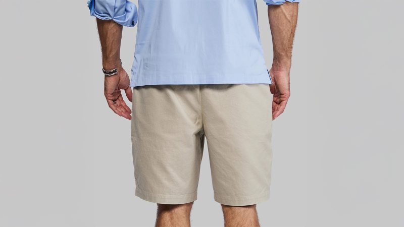 Vollebak Indestructible Chino Shorts are crafted from cotton-Dyneema fabric, featuring Cordura-reinforced pockets and a minimalist design designed for rugged, all-terrain performance.