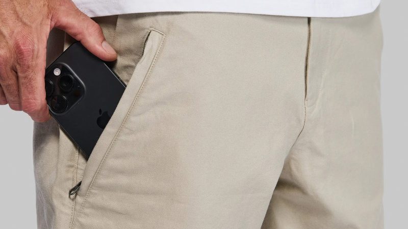 Vollebak Indestructible Chino Shorts are crafted from cotton-Dyneema fabric, featuring Cordura-reinforced pockets and a minimalist design designed for rugged, all-terrain performance.