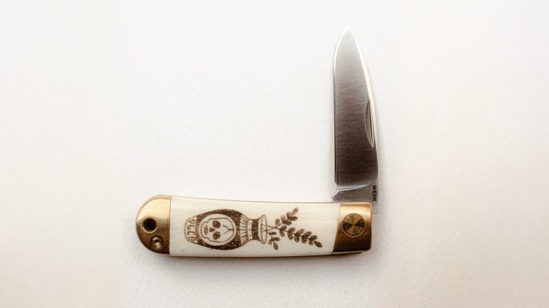 The WESN x P&Co. Scrimshaw Henry pocket knives feature laser-etched tattoo-style artwork on titanium handles, blending EDC functionality with heritage design.