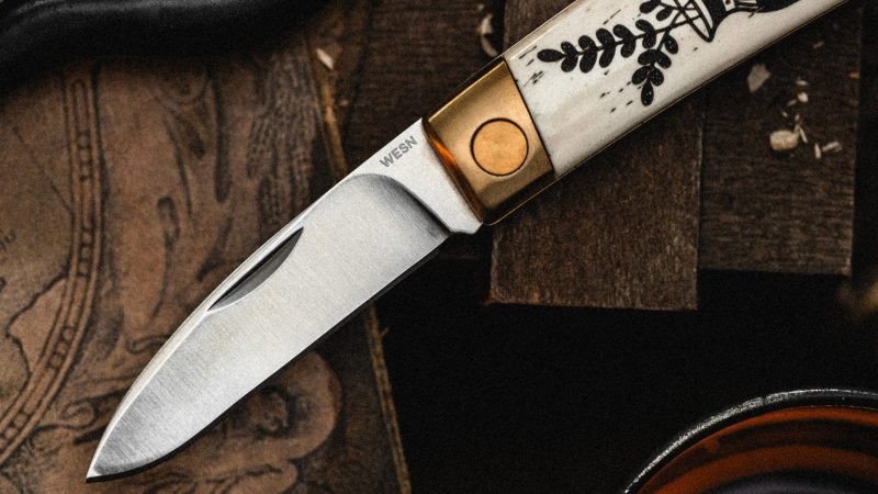 The WESN x P&Co. Scrimshaw Henry pocket knives feature laser-etched tattoo-style artwork on titanium handles, blending EDC functionality with heritage design.