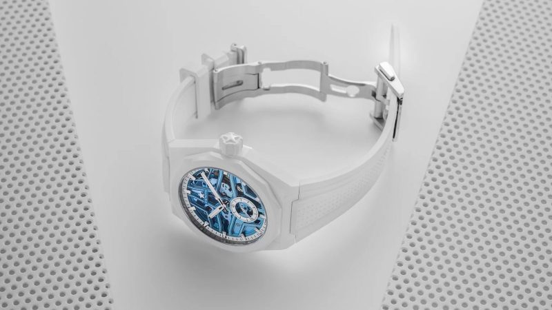Limited‑edition Zenith Defy Skyline Skeleton White Surfer in 41 mm white ceramic, blue gradient skeleton dial, integrated bracelet and quick‑change strap.