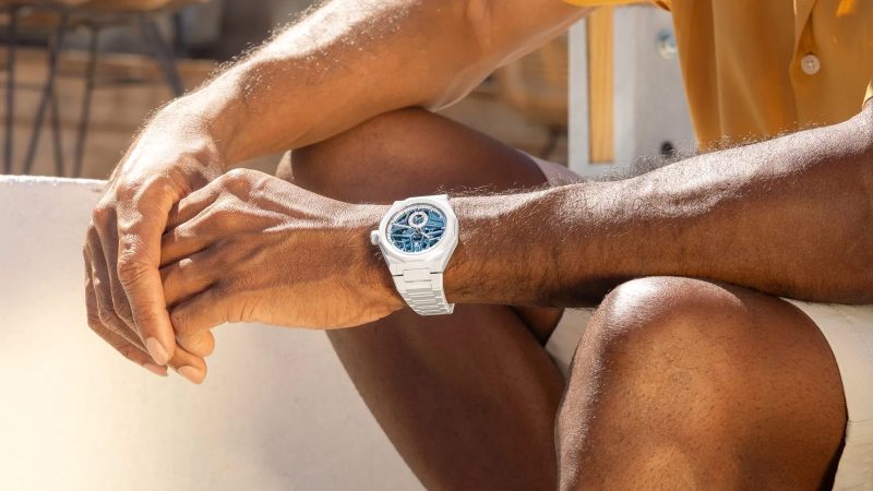 Limited‑edition Zenith Defy Skyline Skeleton White Surfer in 41 mm white ceramic, blue gradient skeleton dial, integrated bracelet and quick‑change strap.