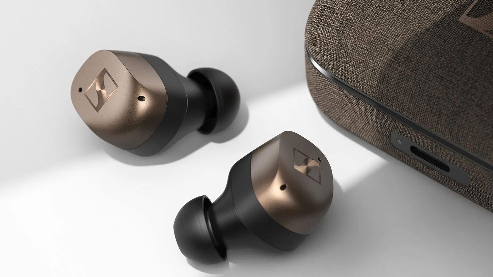 Close-up of Sennheiser MOMENTUM True Wireless 4 earbuds with premium matte finish—one of the best wireless earbuds for audiophiles.