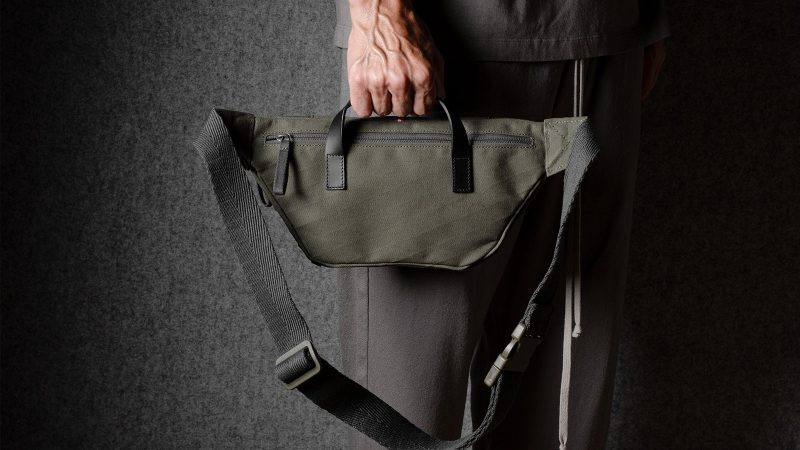 Hardgraft Closest Ally Belt Bag, crafted from weatherproof X-Pac® cotton laminate with Italian leather, features an adjustable strap and a wool-lined interior, made in Italy.