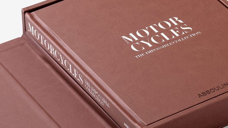 Assouline’s The Impossible Collection of Motorcycles (2nd Edition) is a luxury coffee table book featuring iconic bikes from Harley, Ducati, and more.