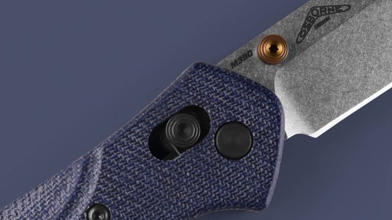 Benchmade 940‑04 Osborne folding knife with satin M390 reverse‑tanto blade, blue denim micarta handle, Axis lock, and reversible clip.