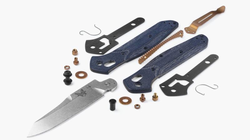 Benchmade 940‑04 Osborne folding knife with satin M390 reverse‑tanto blade, blue denim micarta handle, Axis lock, and reversible clip.