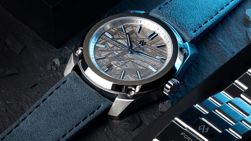 Formex Essence FortyOne Space Ghost watch featuring a 41mm stainless steel case, meteorite dial, COSC-certified automatic movement, and micro-adjustable bracelet.