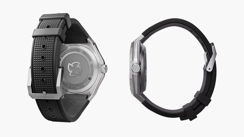 Micromilspec Dualtimer GMT pilot watch in brushed stainless steel with dual-color lume, Swiss automatic movement, and 24-hour rotating bezel.