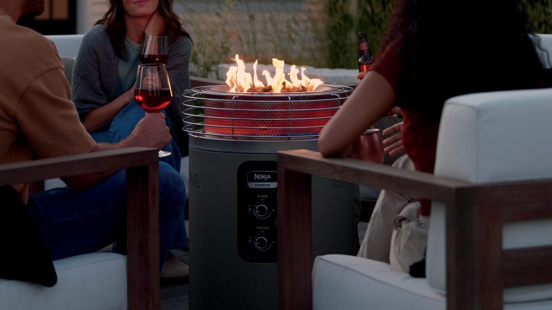 Ninja Fireside360 outdoor propane fire pit and heater with smokeless flames, 360-degree HeatZone technology, and dial-controlled flame and heat modes.