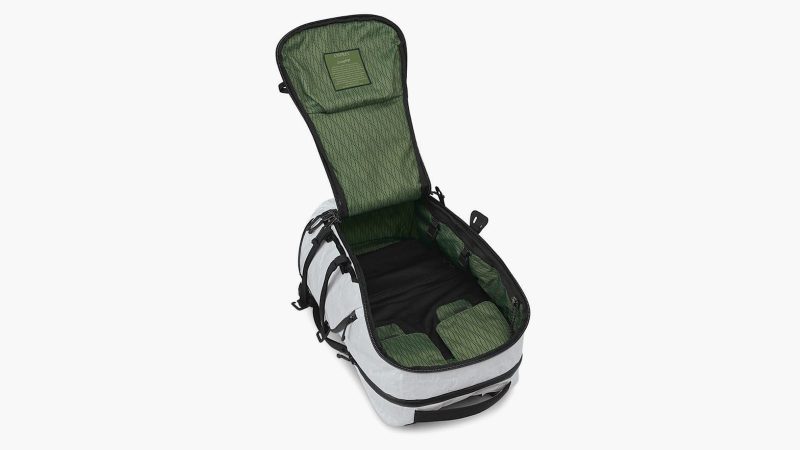 Osprey x Carryology Archeon “Fūjin” backpack and modular pouch with ALUULA Durlyte™ fabric, modular pouch attachment, AirSpeed suspension, and wind camo interior.