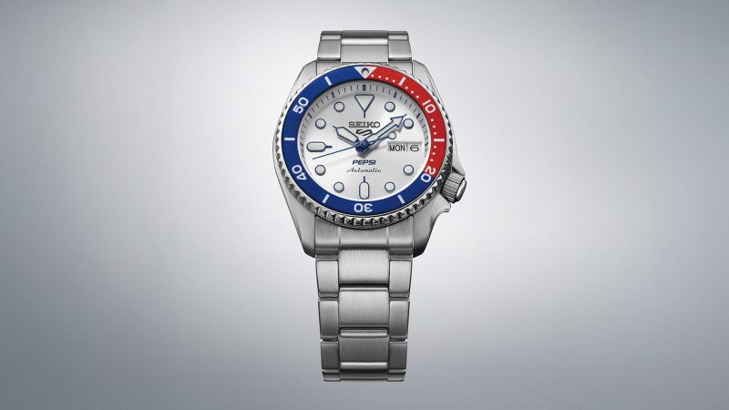 Official Seiko 5 Sports x Pepsi limited-edition watches featuring red-and-blue bezels, modern and vintage styles, and collectible soda-can-inspired packaging.