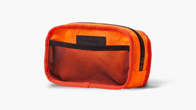 The Brown Buffalo Conceal Waistpack has a streamlined design, taco-shell opening, and eco-friendly UltraGrid recycled nylon fabric.