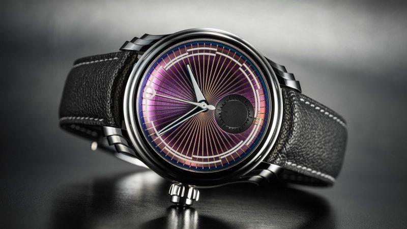 Ming 57.04 Iris left-handed monopusher chronograph with color-shifting Iris-effect dial, sculptural steel case, and Swiss hand-wound movement.