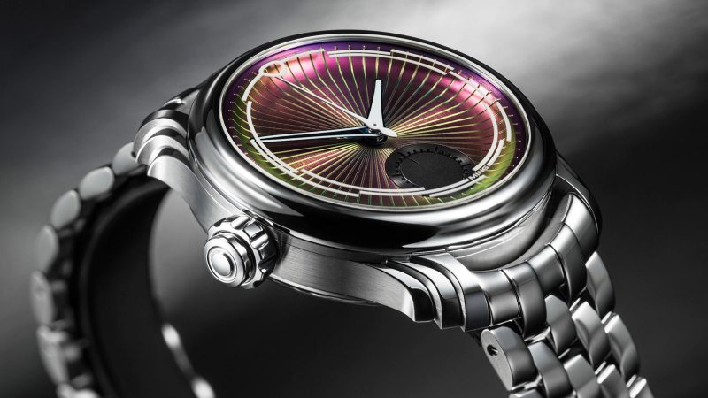 Ming 57.04 Iris left-handed monopusher chronograph with color-shifting Iris-effect dial, sculptural steel case, and Swiss hand-wound movement.