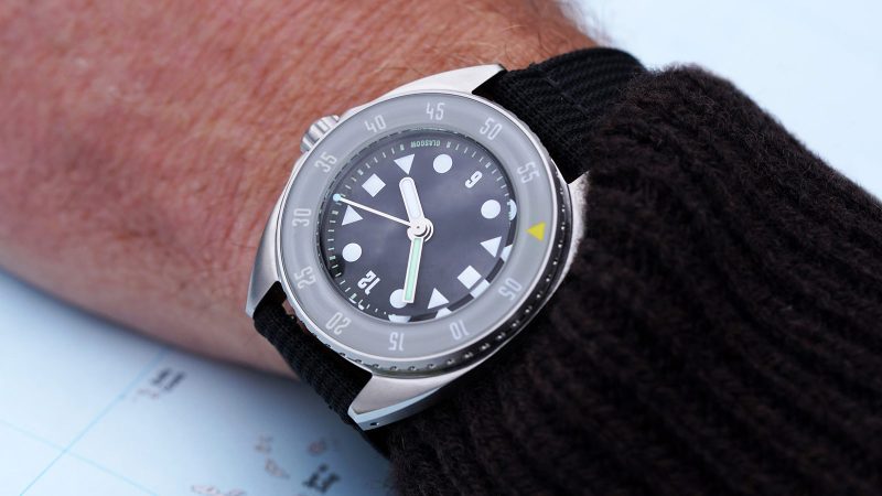 Paulin Mara dive watch with sapphire bezel, vivid dial, and interchangeable straps.