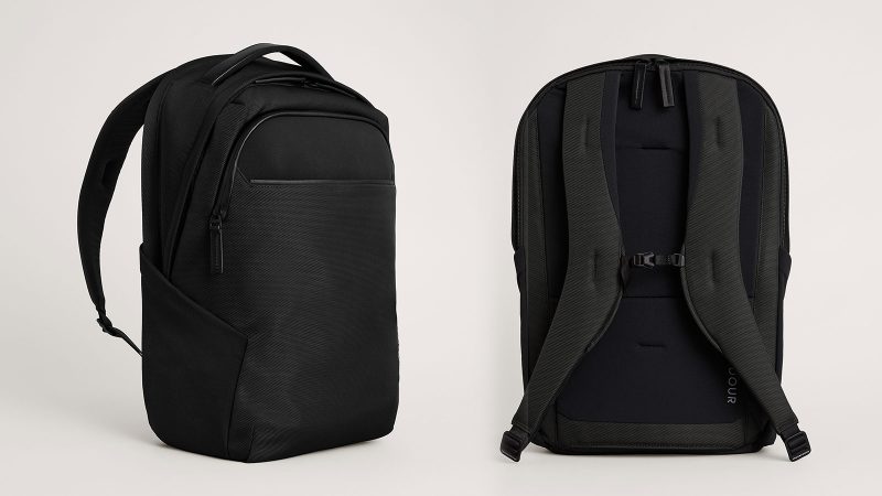 Troubadour Neo Backpack features a waterproof coating, a laptop sleeve, and a lightweight design for travel and commuting.