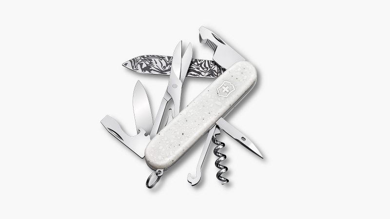 Victorinox Special Companion Damast Limited Edition 2025 pocket knife with Damascus steel blade and matte white Corian handle.