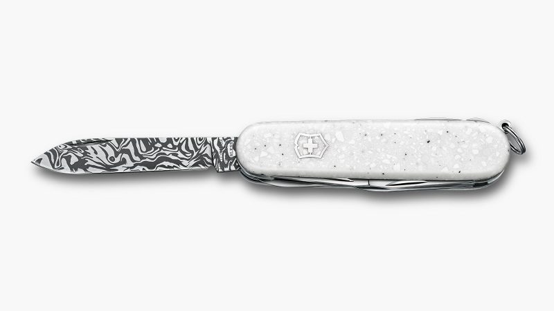 Victorinox Special Companion Damast Limited Edition 2025 pocket knife with Damascus steel blade and matte white Corian handle.
