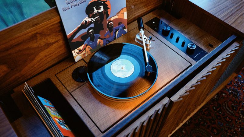 The Wrensilva Larrabee Creator Edition M1 record console with walnut cabinetry, Guatemalan-inspired details, custom speakers, and studio-grade analog sound.