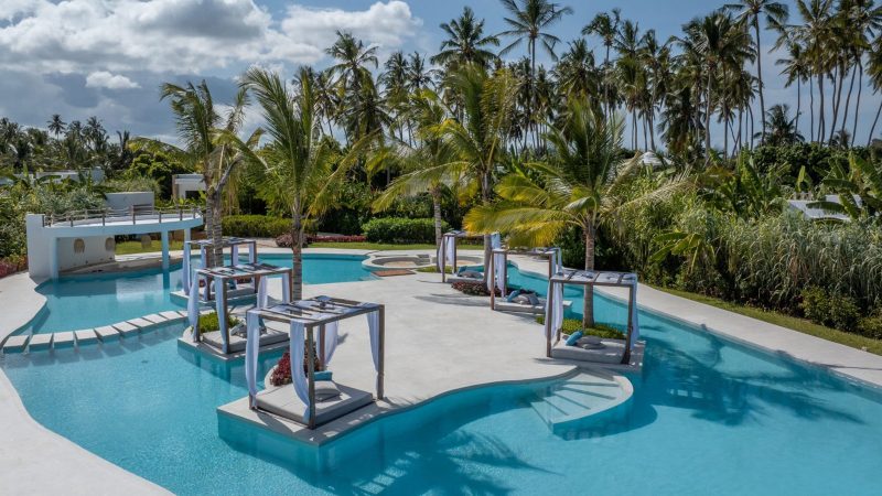 Ycona Luxury Resort in Zanzibar features private beachfront villas surrounded by lush tropical gardens and sustainable architecture.